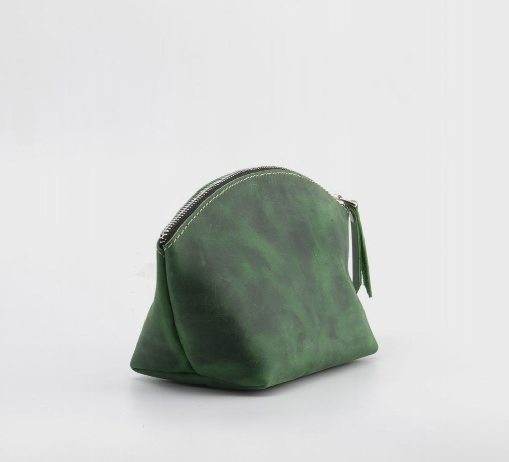 Green makeup bag turning