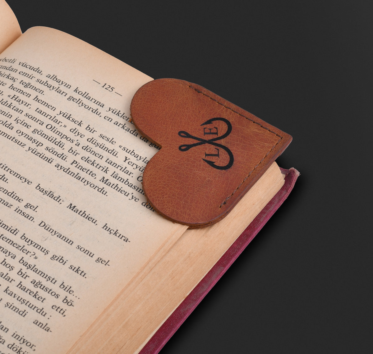 Heart bookmark on a book page