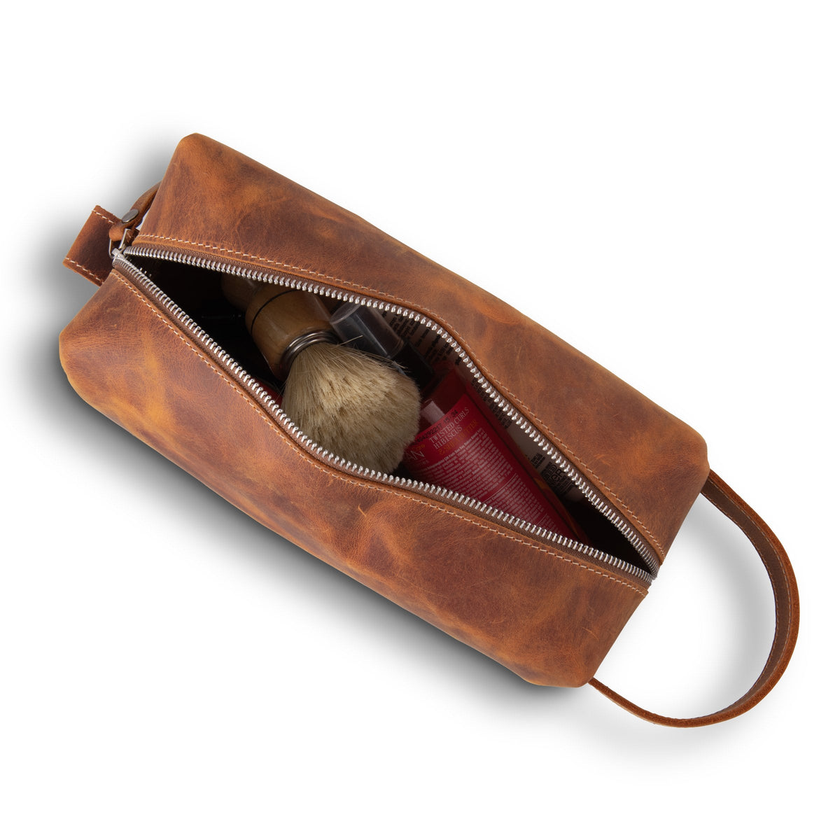 Open dopp kit with toiletries